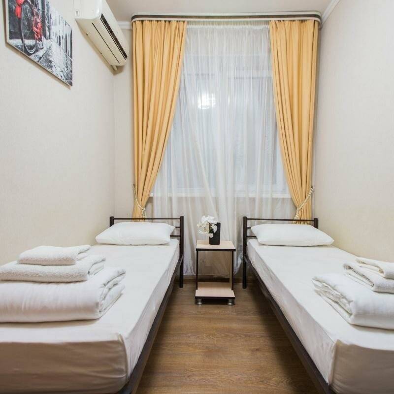 Фотографии номера Стандартный номер с 2 отдельными кроватями в Гостинице Мечта у моря Адлер