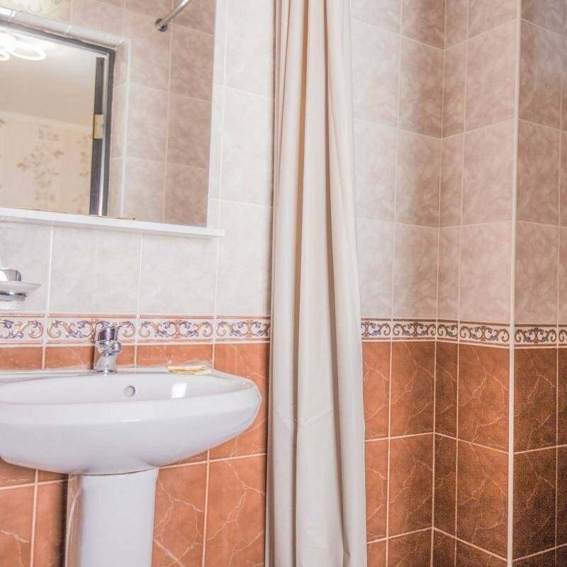 Фотографии номера Стандартный номер с 2 отдельными кроватями в Гостинице Мечта у моря Адлер